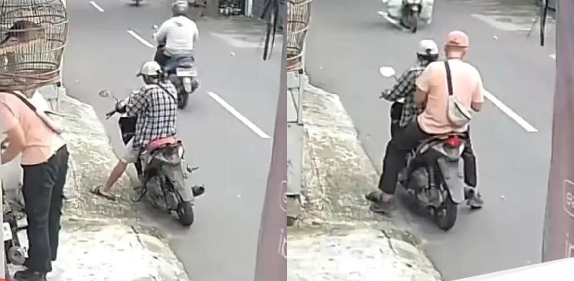 dua-pria-kelihatan-menempelkan-stiker-di-motor-hingga-dinding-di-jaksel-pengunggah-menyebut-qr-code-di-stiker-itu-mengarahkan--1771207245314_169